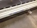 Fischbein Mdl. PILS 300 Inline bag sealer with conveyor