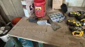 Milwaukee and Dewalt Hand Tool and Battery Set and Table