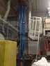approx. 22ft Universal Industries Mdl. C-3 Bucket elevator