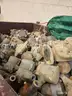 large bin of Brass water meters