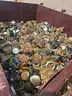 large bin of Brass water meters