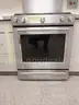 Residential kitchen gas range and ventilation hood