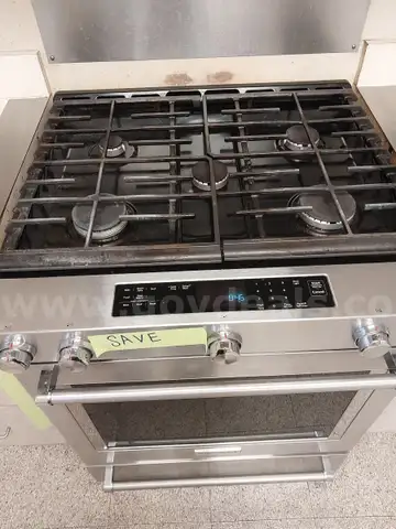 Residential kitchen gas range and ventilation hood