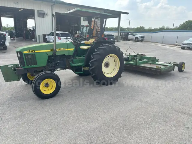1999 John Deere 5410 with 10 ft shredder