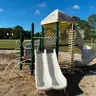 Playground structure with various steps, ladders, steps, slides etc