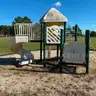 Playground structure with various steps, ladders, steps, slides etc