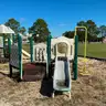 Playground structure with various steps, ladders, steps, slides etc