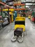RICO ELECTRIC PALLET JACK MODEL PWH-150 WITH GREEN ENERGY BATTERY CHARGER MODEL OD12-0550-C