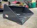 UNUSED 2025 WOLVERINE TRACK DUTY BUCKET ATTACHMENT MODEL TDB-11-66W FOR UNIVERSAL SKID STEER