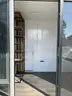 UNUSED 13FT HOUSE WITH SHOWER ROOM, TOILET, SINK, WINDOW, PLUMBING AND ELECTRIC HOOK UP