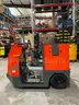 TOYOTA STAND ON TUGGER MODEL CBTY4, ELECTRIC, 48V, APPROX MAX DRAWBAR PULL 880LBS, NEEDS BATTERY
