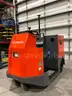TOYOTA STAND ON TUGGER MODEL CBTY4, ELECTRIC, 48V, APPROX MAX DRAWBAR PULL 880LBS, NEEDS BATTERY