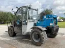 2014 GENIE TELEHANDLER MODEL GTH-5519; DIESEL POWERED; APPROX MAX LIFT CAPACITY W/ PALADIN ATTACHMENT