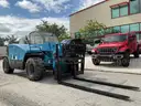 2014 GENIE TELEHANDLER MODEL GTH-5519; DIESEL POWERED; APPROX MAX LIFT CAPACITY W/ PALADIN ATTACHMENT