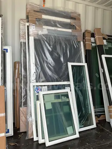 UNUSED LOT OF ASSORTED SCREENS / DOORS &#x26; WINDOWS