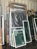 UNUSED LOT OF ASSORTED SCREENS / DOORS &#x26; WINDOWS