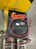 RICO ELECTRIC PALLET JACK MODEL PWH-150 WITH GREEN ENERGY BATTERY CHARGER MODEL OD12-0550-C