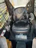 JOHN DEERE SKID STEER MODEL 315, DIESEL, ENCLOSED CAB , UNUSED ROLLER ATTACHMENT, SMOOTH TIRES, RUNS AND OPERATES