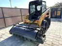 JOHN DEERE SKID STEER MODEL 315, DIESEL, ENCLOSED CAB , UNUSED ROLLER ATTACHMENT, SMOOTH TIRES, RUNS AND OPERATES