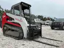 TAKEUCHI MULTI TERRAIN SKID STEER LOADER MODEL TL140, DIESEL
