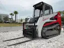 TAKEUCHI MULTI TERRAIN SKID STEER LOADER MODEL TL140, DIESEL