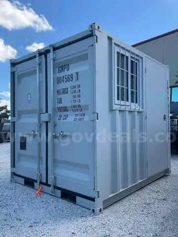 UNUSED 8FT MULTI-USE CONTAINER W/ SIDE DOOR & WINDOW, FORK POCKETS