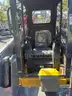 NEVER USED SKID STEER LOADER, BUCKET ATTACHMENT