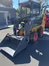 NEVER USED SKID STEER LOADER, BUCKET ATTACHMENT