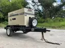 MULTIQUIP WHISPER WATT TRAILER MOUNTED AC GENERATOR MODEL DCA-25SSIU2, DIESEL