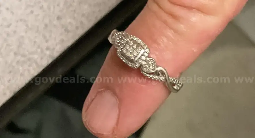 Silver ring; size unknown