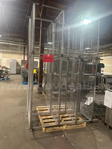 2 Kitchen Racks - heavy duty. Welded. Need long trailer to remove - has extra Shelving for welding