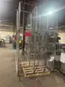 2 Kitchen Racks - heavy duty. Welded. Need long trailer to remove - has extra Shelving for welding
