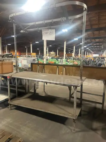 Stainless steel kitchen table with Baker&#x2019;s rack