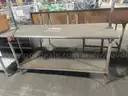 Stainless steel kitchen table with Baker&#x2019;s rack