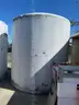 (2) 6100-gallon vertical liquid storage tanks