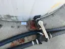 (2) 6100-gallon vertical liquid storage tanks