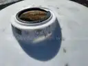 (2) 6100-gallon vertical liquid storage tanks