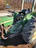 John Deere 830 Tractor with three-point sprayer