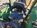 John Deere 830 Tractor with three-point sprayer