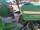 John Deere 830 Tractor with three-point sprayer