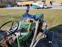 John Deere 830 Tractor with three-point sprayer