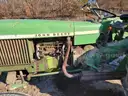 John Deere 830 Tractor with three-point sprayer