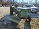 John Deere 830 Tractor with three-point sprayer