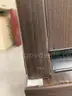 1- 3 Piece Dark Brown Pressboard Desk