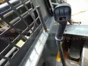 2005 New Holland LS180 Skid Loader - Out Side Gated Lot Gate 1