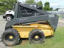 2005 New Holland LS180 Skid Loader - Out Side Gated Lot Gate 1