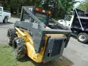 2005 New Holland LS180 Skid Loader - Out Side Gated Lot Gate 1