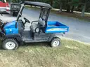 2015 New Holland 125 ATV 4x4 w/ Dump Bed - Outside Gate Lot