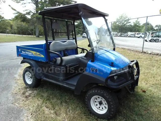 2015 New Holland 125 ATV 4x4 w/ Dump Bed - Outside Gate Lot