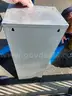 two drawer metal container with plastic bins in each drawer